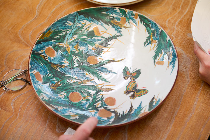 Butterflies fluttering around plants and trees