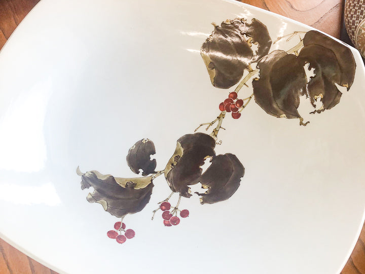 Kutani ware painted with motifs of plants and trees